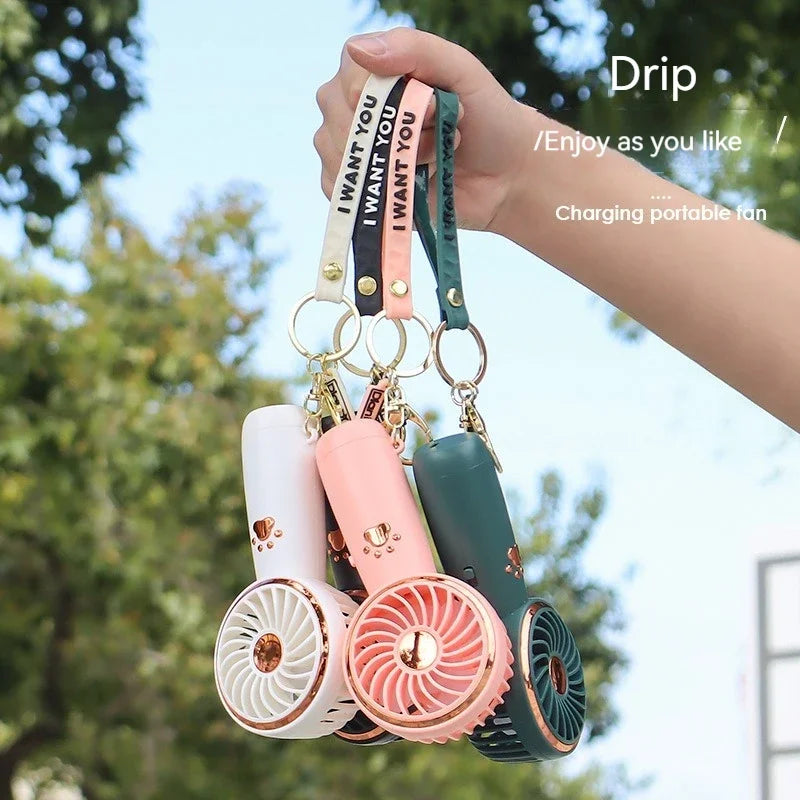 New Handheld Mini Fan Cute Extra Long Range with Keychain USB Charging Outdoor Camping Portable Air Conditioner